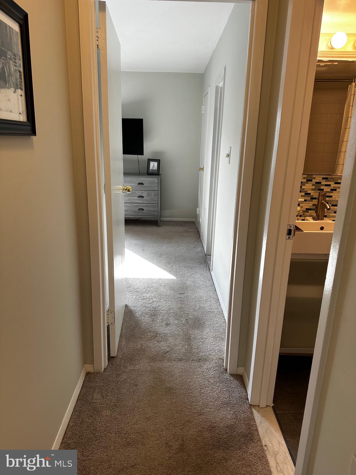 3854 Bel Pre Road, Unit 10 Silver Spring, MD 20906 - Photo 17 of 24 view down hall into main bedroom