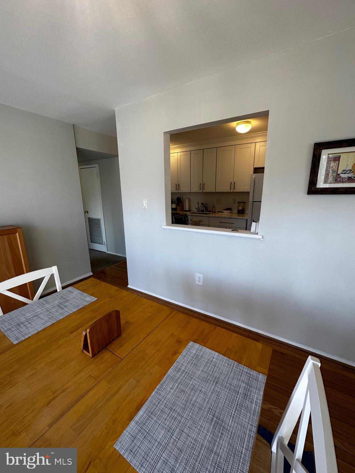 3854 Bel Pre Road, Unit 10 Silver Spring, MD 20906 - Photo 8 of 24 looking into kitchen from dining area