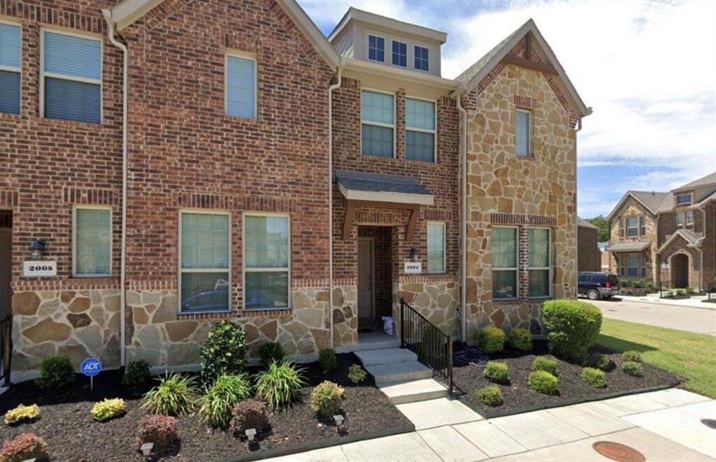 2001 Juniper Pass Way Mesquite, TX 75149 - Photo 1 of 12 Traditional-style house with stone siding and brick siding