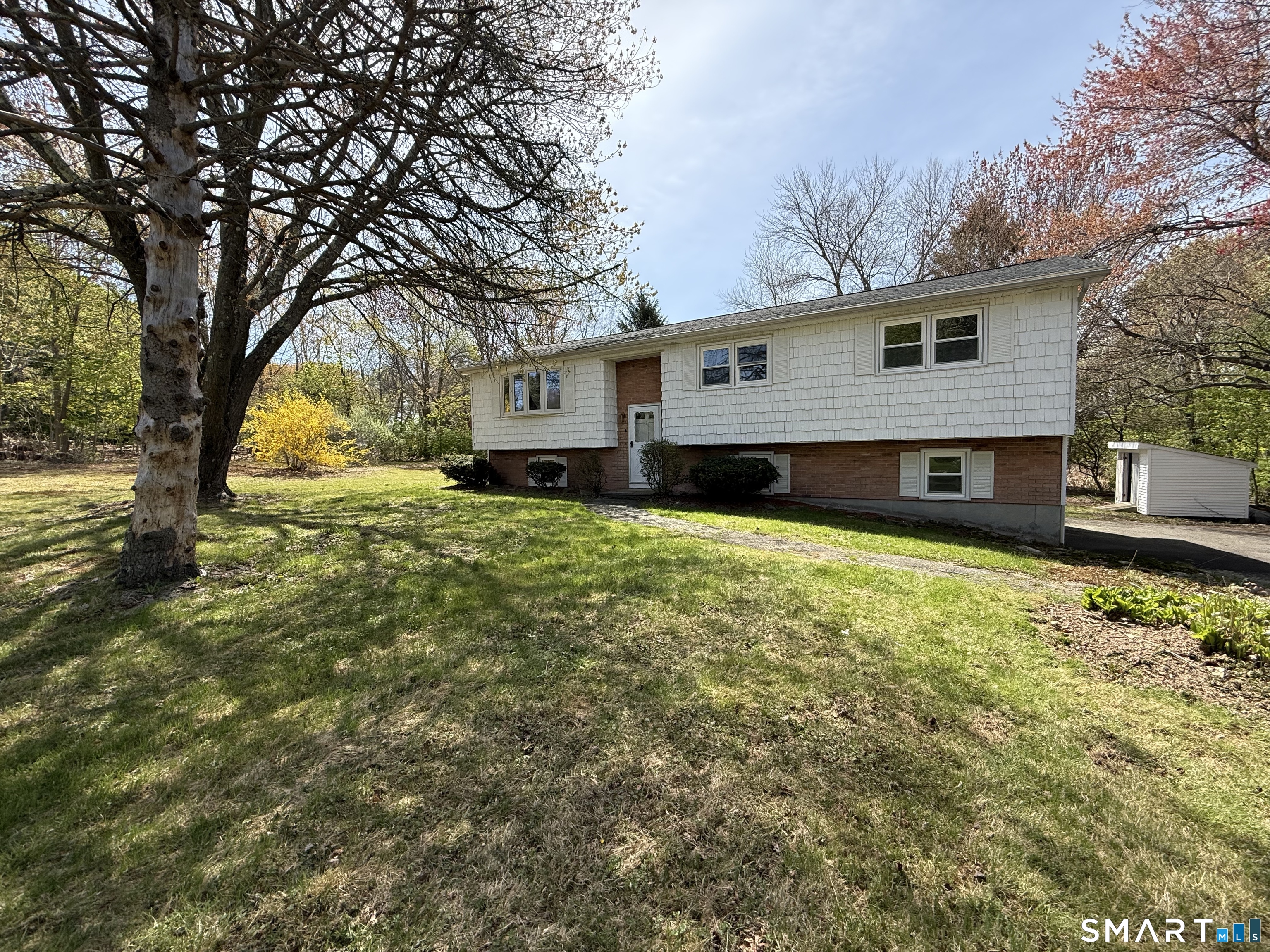 1 Winfield Avenue Wolcott, CT 06716 - Photo 1 of 38 a view of a house with a yard