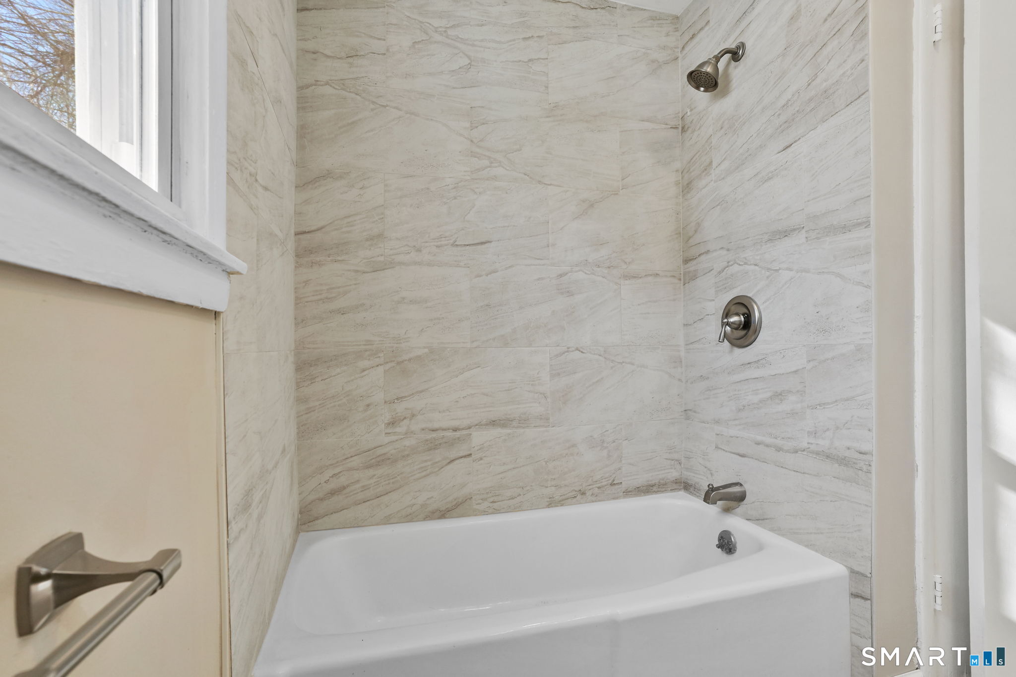 1 Winfield Avenue Wolcott, CT 06716 - Photo 17 of 38 a bathroom with a bathtub