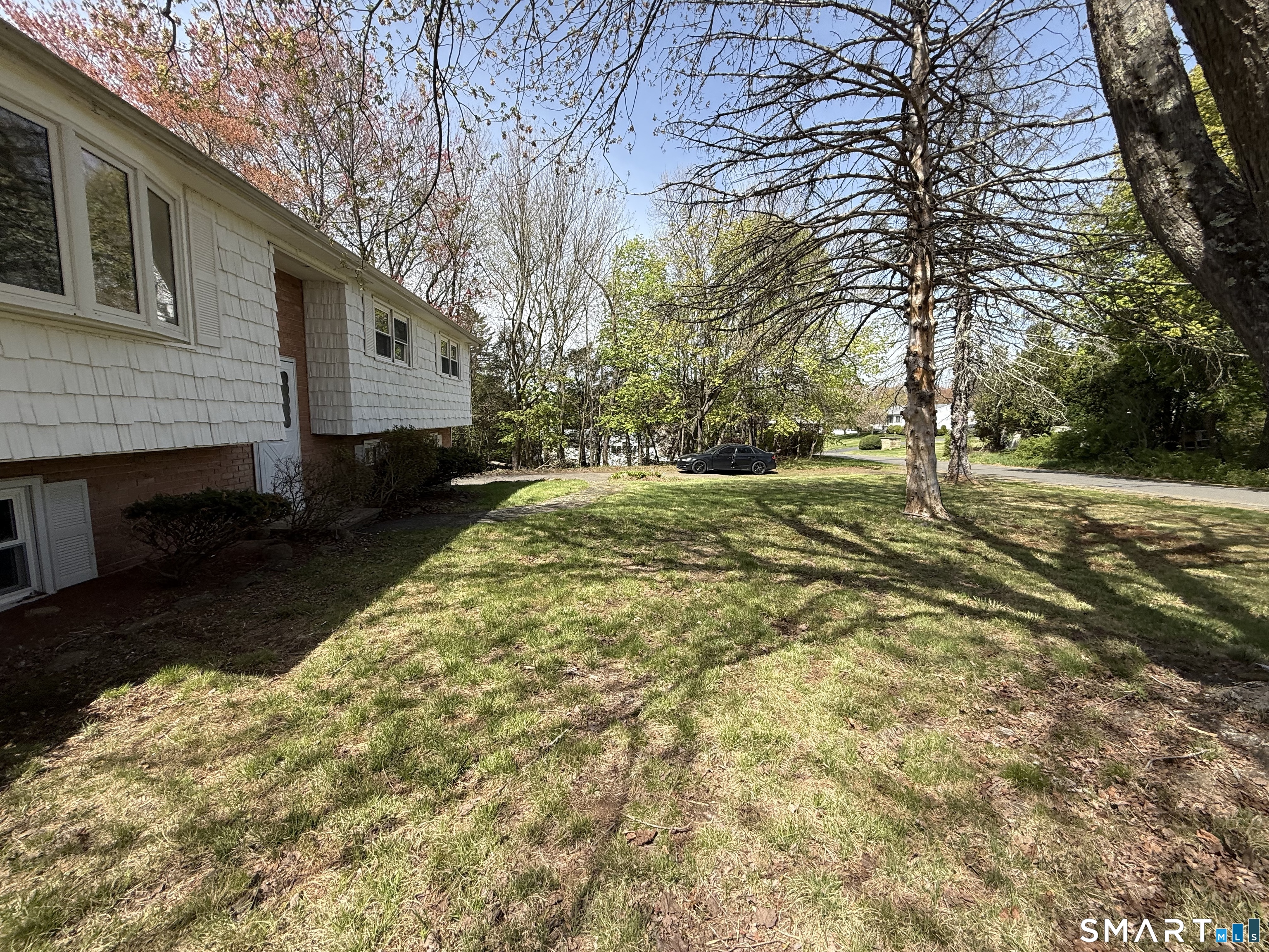 1 Winfield Avenue Wolcott, CT 06716 - Photo 35 of 38 a view of a yard with an outdoor space