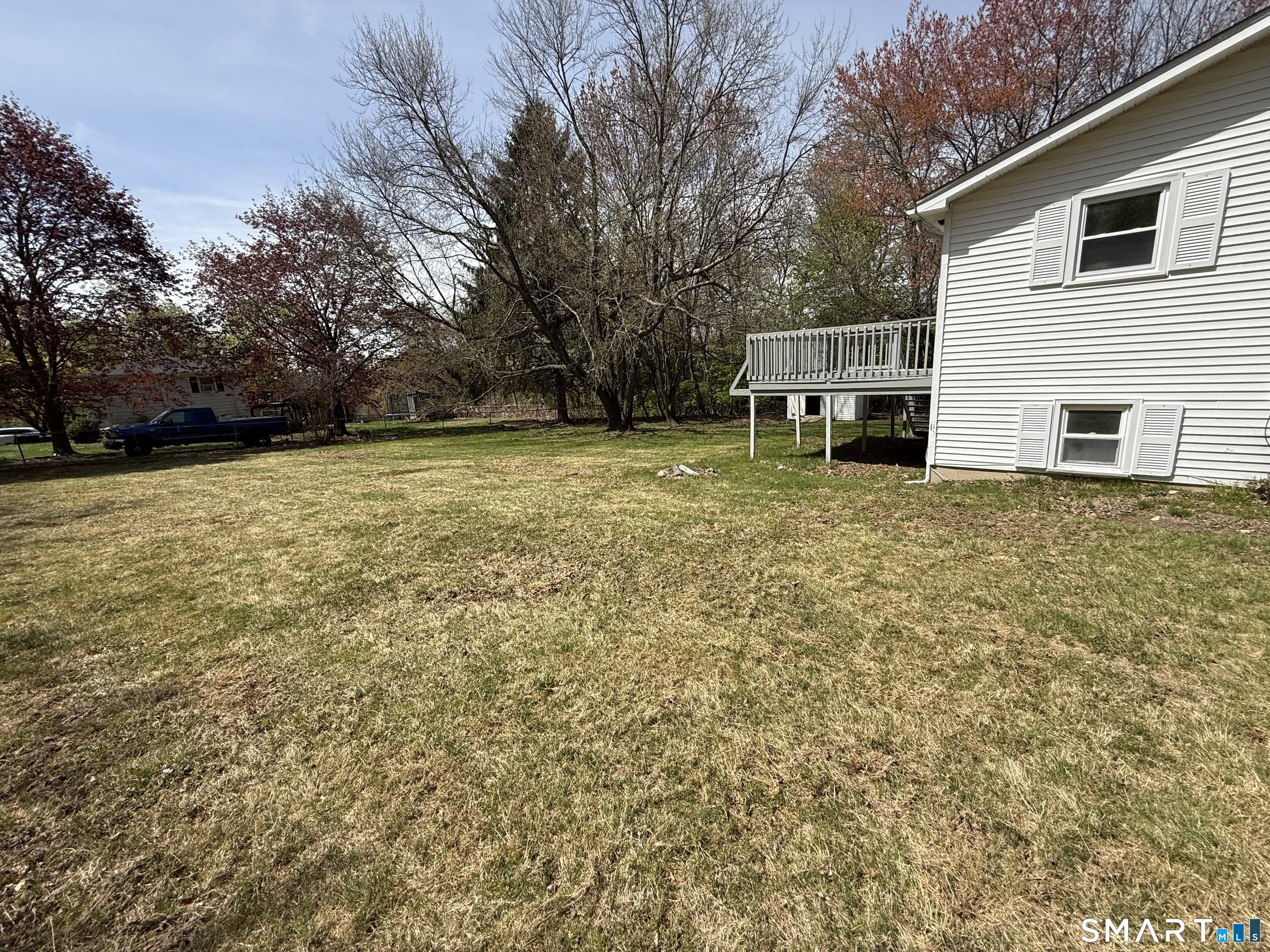 1 Winfield Avenue Wolcott, CT 06716 - Photo 36 of 38 a backyard of a house with table and chairs