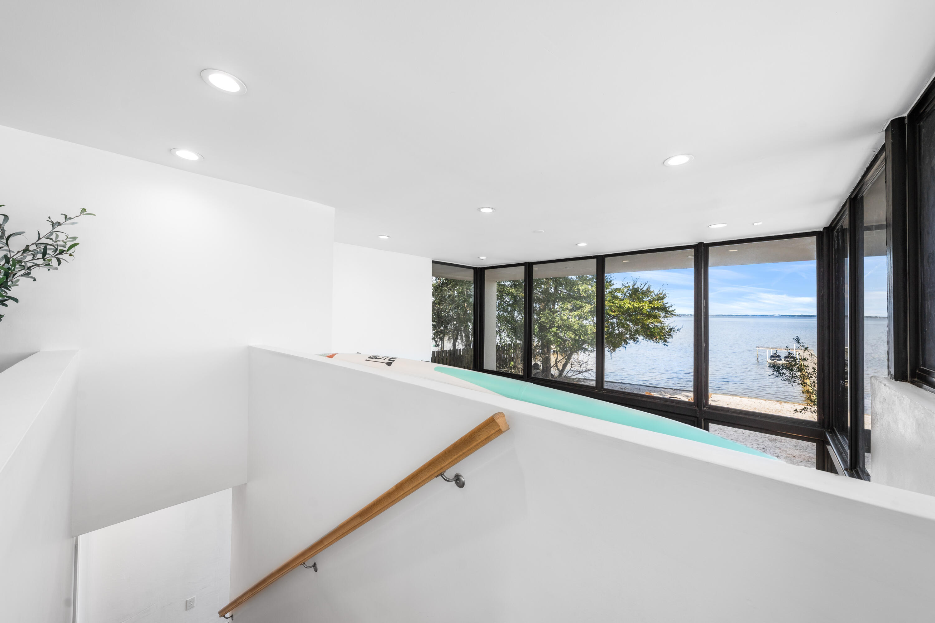149 Native Tree Lane Santa Rosa Beach, FL 32459 - Photo 26 of 52 a view of an empty room with a floor to ceiling window