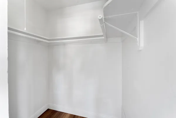 a view of an empty walk in closet
