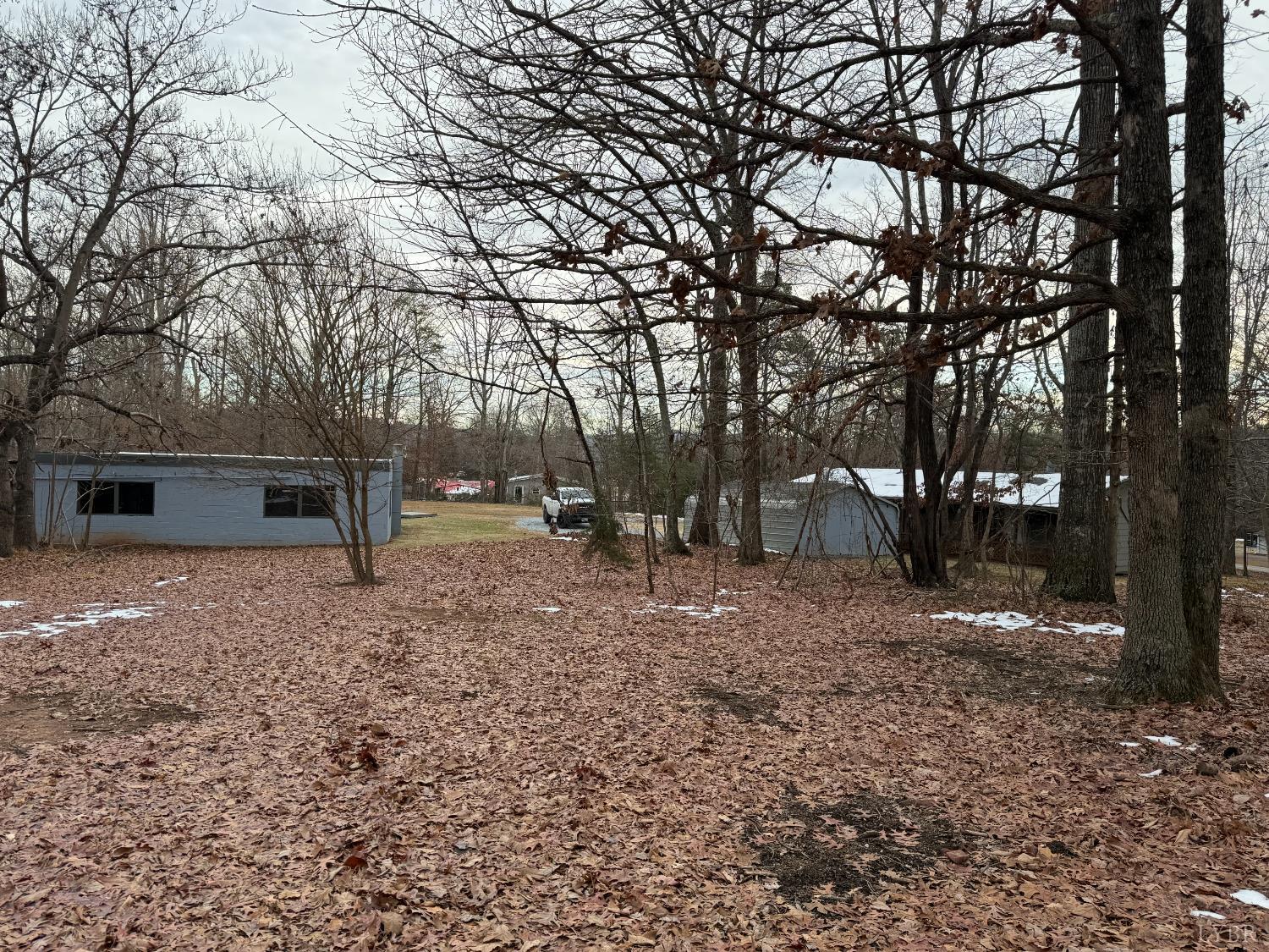271 Candlemakers Lane Rustburg, VA 24588 - Photo 17 of 31 a view of a yard with trees
