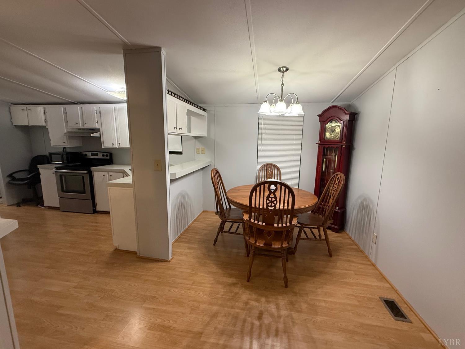 271 Candlemakers Lane Rustburg, VA 24588 - Photo 8 of 31 a dining room with furniture and window