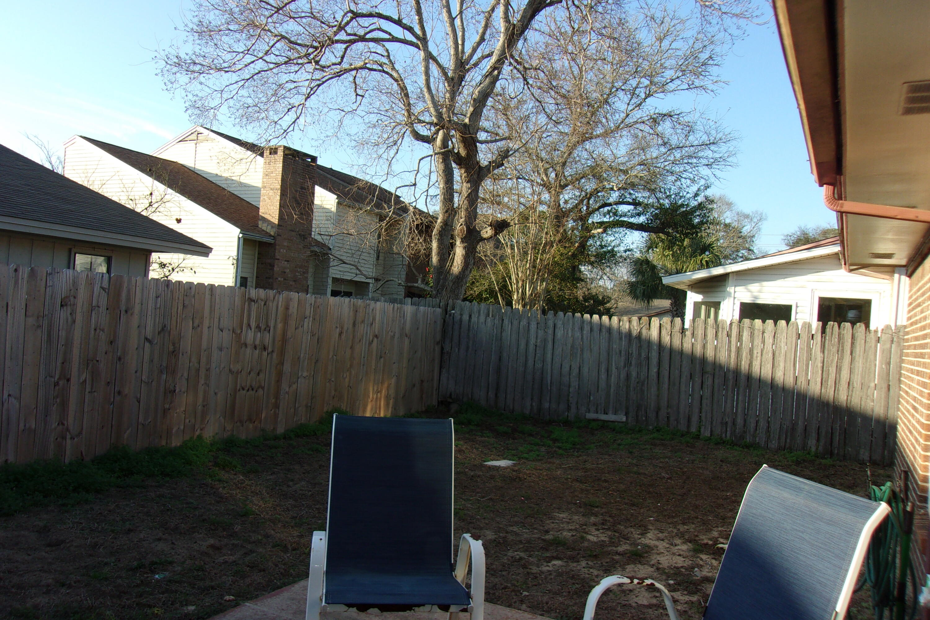 93 Cutter Lane Shalimar, FL 32579 - Photo 8 of 10 a backyard of a house with lots of green space