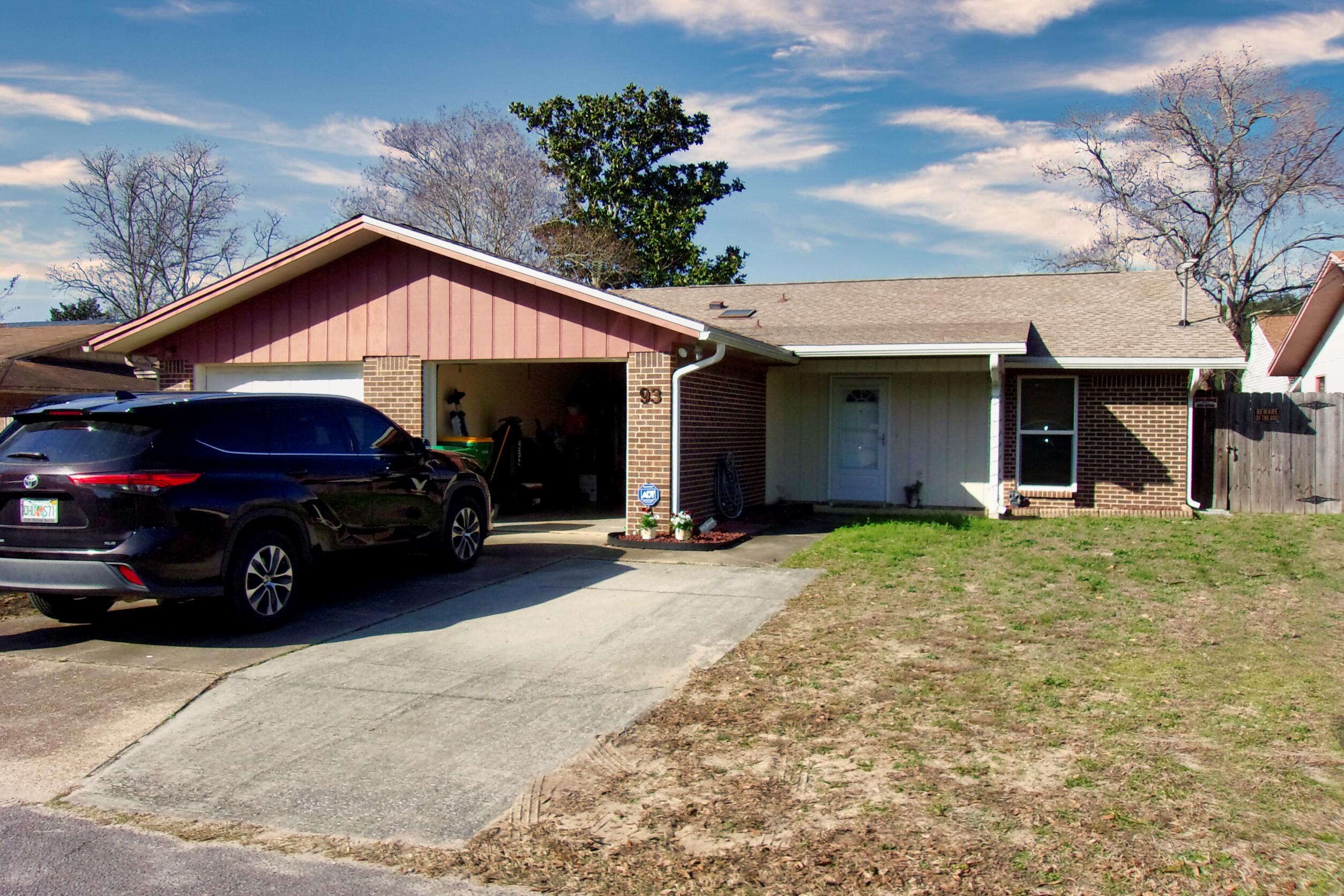 93 Cutter Lane Shalimar, FL 32579 - Photo 10 of 10 a view of a house with a patio