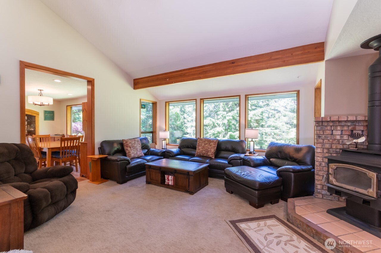 492 Walkabout Way Port Angeles, WA 98363 - Photo 20 of 40 a living room with furniture and a large window