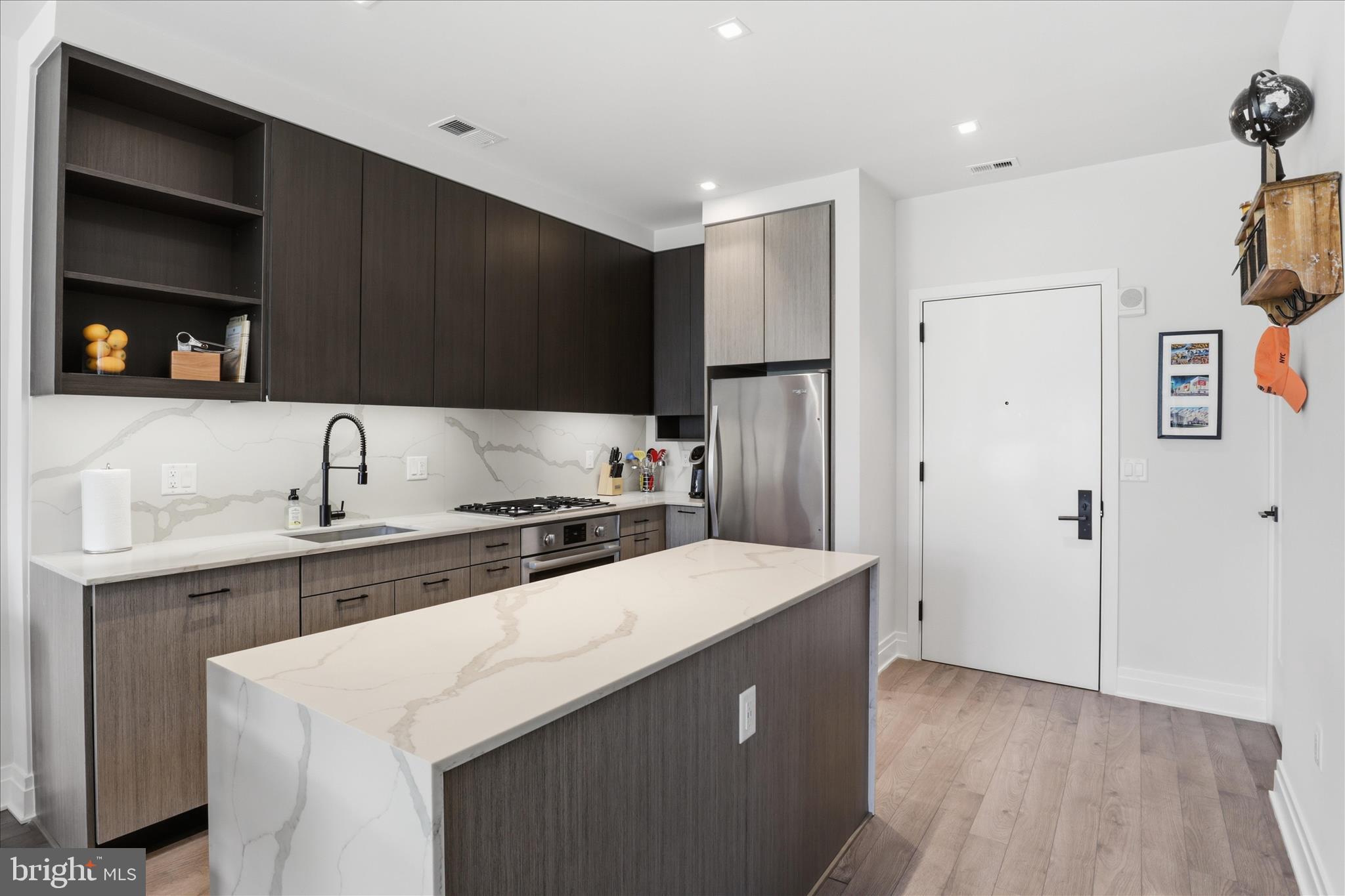 900 11th Street Southeast, Unit 203 Washington, DC 20003 - Photo 4 of 36 Kitchen w/ SS Appliances