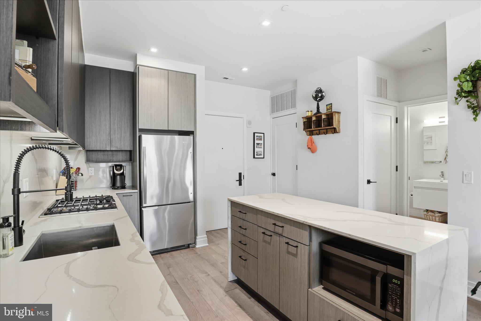 900 11th Street Southeast, Unit 203 Washington, DC 20003 - Photo 5 of 36 Kitchen w/ view of Entry