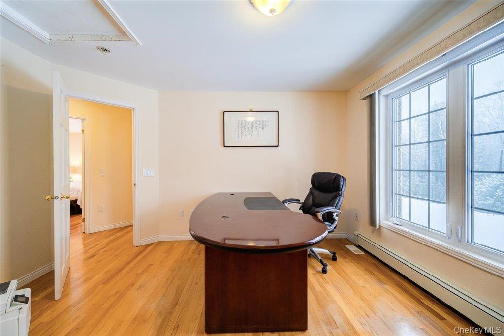 236 Budd Road Wurtsboro, NY 12790 - Photo 11 of 42 a view of a workspace with furniture and a window