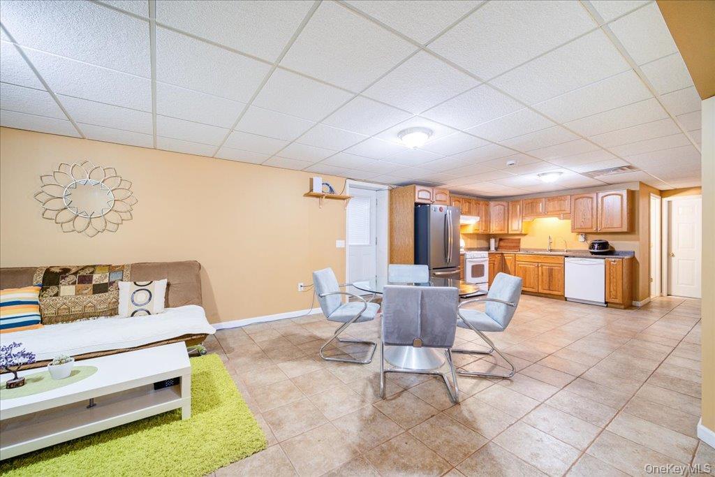 236 Budd Road Wurtsboro, NY 12790 - Photo 12 of 42 a living room with furniture and kitchen view