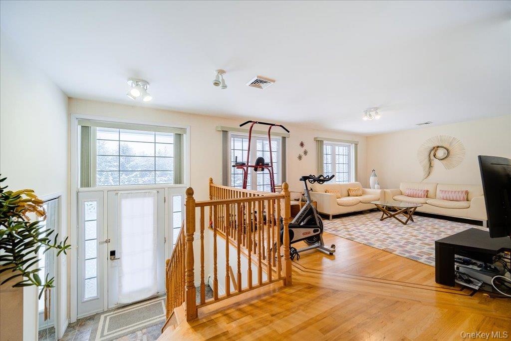 236 Budd Road Wurtsboro, NY 12790 - Photo 5 of 42 a living room with furniture fireplace and a window