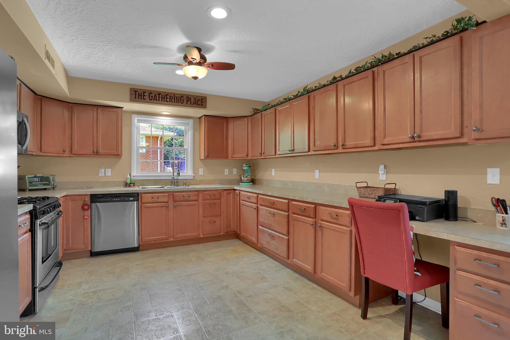 2025 Derry Road York, PA 17408 - Photo 12 of 45 a kitchen with granite countertop a sink cabinets and window