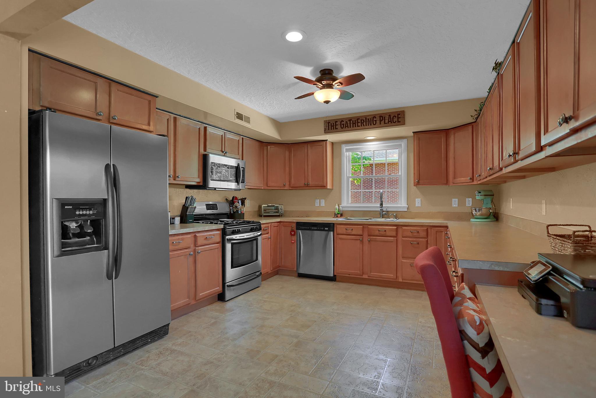 2025 Derry Road York, PA 17408 - Photo 13 of 45 a kitchen with granite countertop stainless steel appliances and wooden cabinets