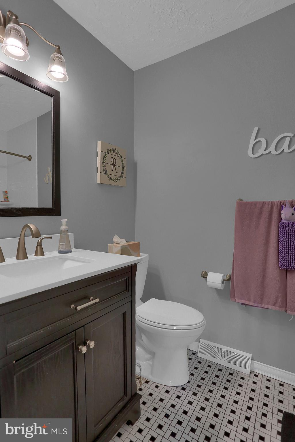 2025 Derry Road York, PA 17408 - Photo 16 of 45 a bathroom with a sink toilet and a mirror