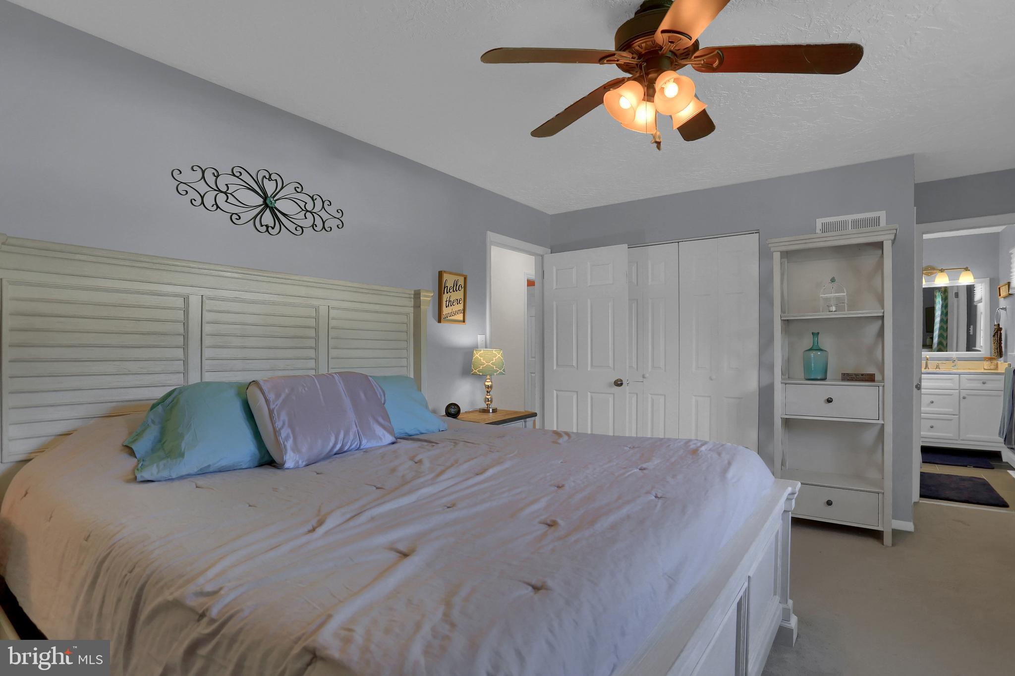 2025 Derry Road York, PA 17408 - Photo 24 of 45 a bedroom with a bed and a chandelier