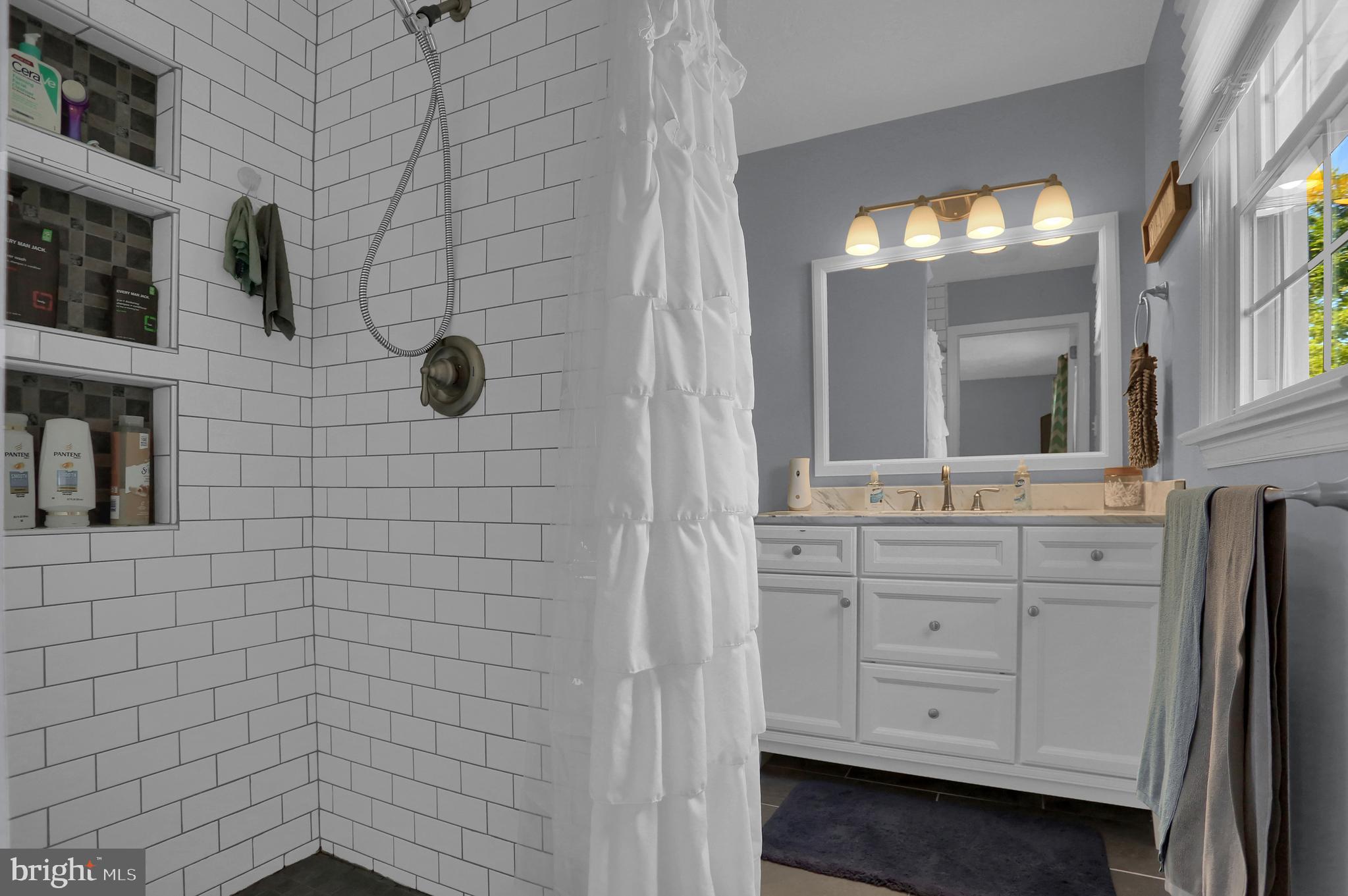 2025 Derry Road York, PA 17408 - Photo 25 of 45 a bathroom with a sink and a mirror