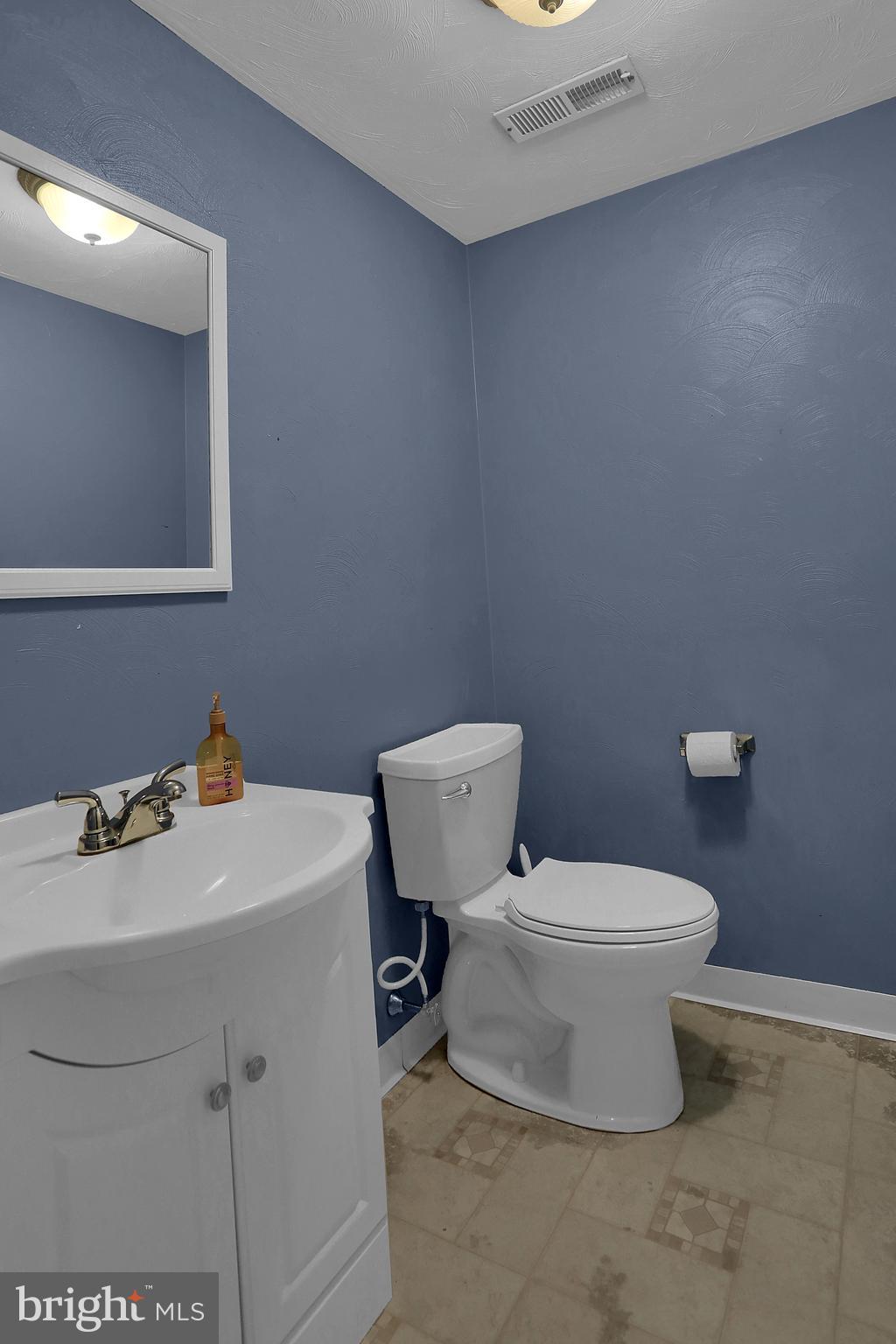 2025 Derry Road York, PA 17408 - Photo 31 of 45 a bathroom with a sink toilet and a mirror