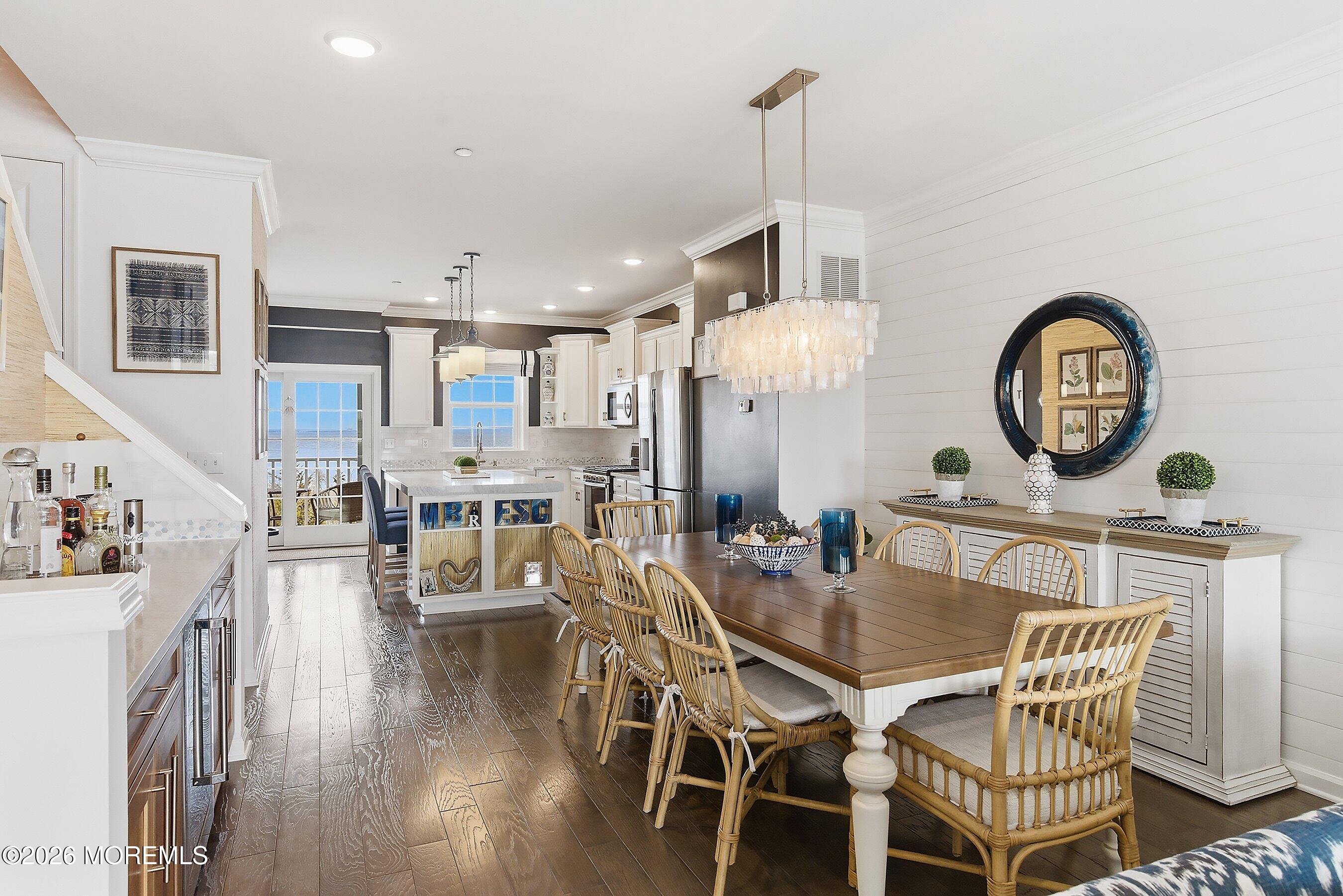 14 Lighthouse Point Road, Unit 604 Highlands, NJ 07732 - Photo 41 of 41 a view of a dining room with furniture and a chandelier