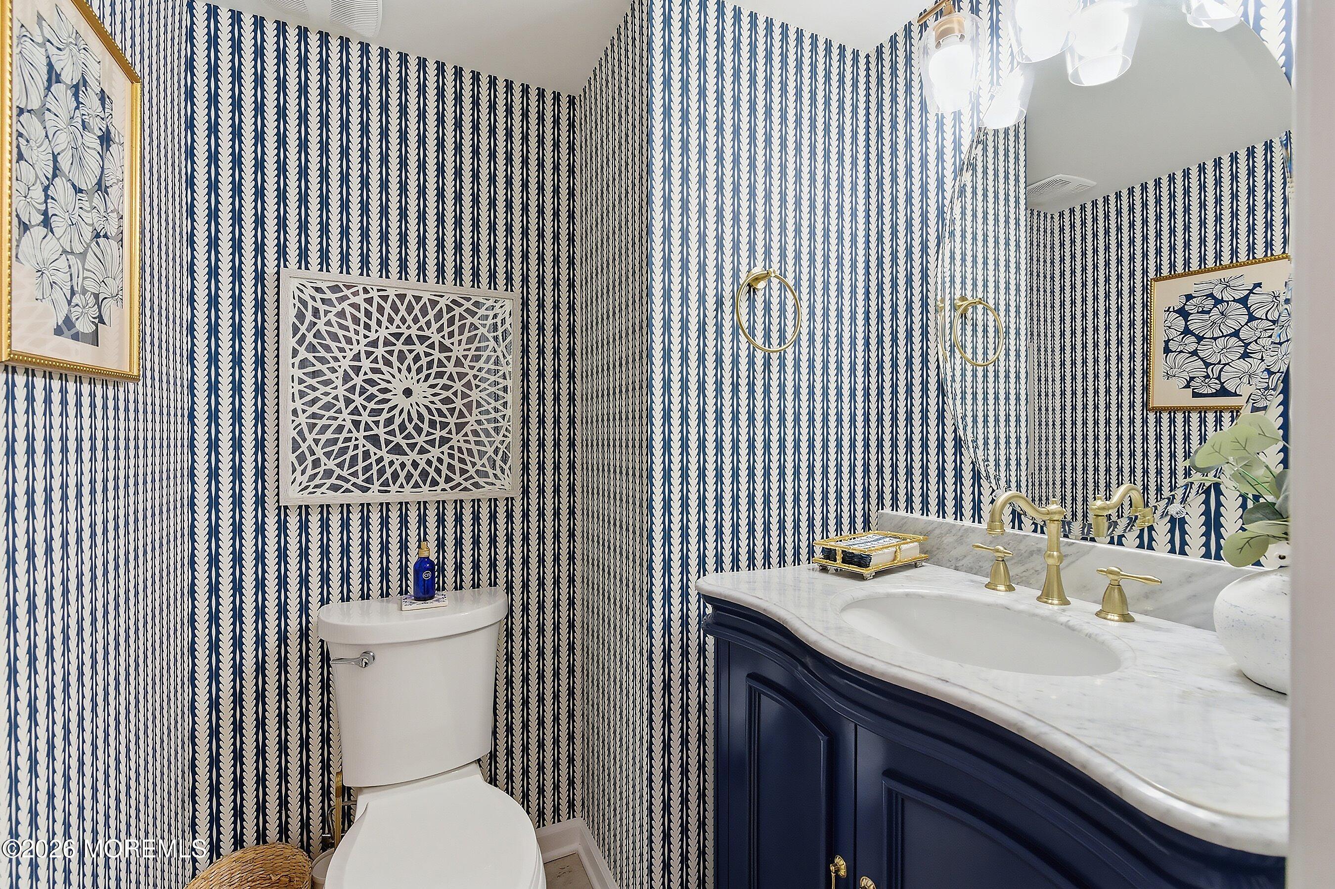 14 Lighthouse Point Road, Unit 604 Highlands, NJ 07732 - Photo 17 of 41 a bathroom with a sink and a toilet