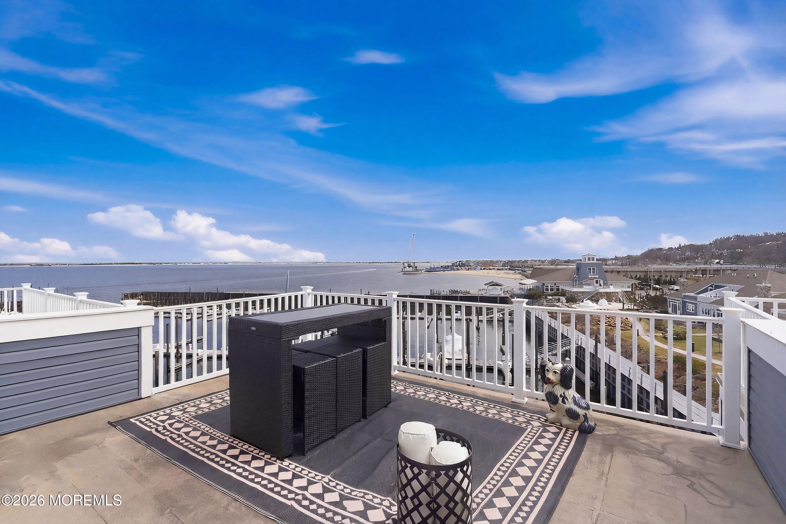 14 Lighthouse Point Road, Unit 604 Highlands, NJ 07732 - Photo 28 of 41 a view of a balcony with wooden floor