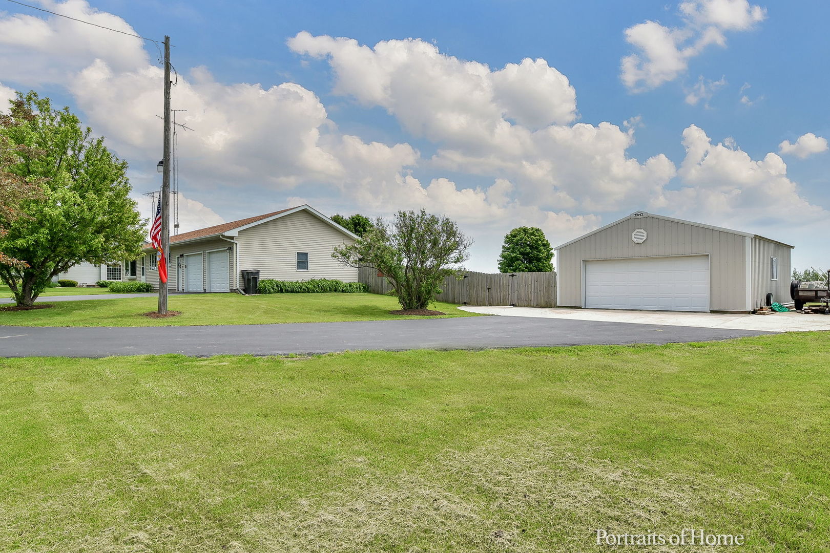 10522 Perry Road DeKalb, IL 60115 - Photo 2 of 27 a view of a house with backyard and a garden