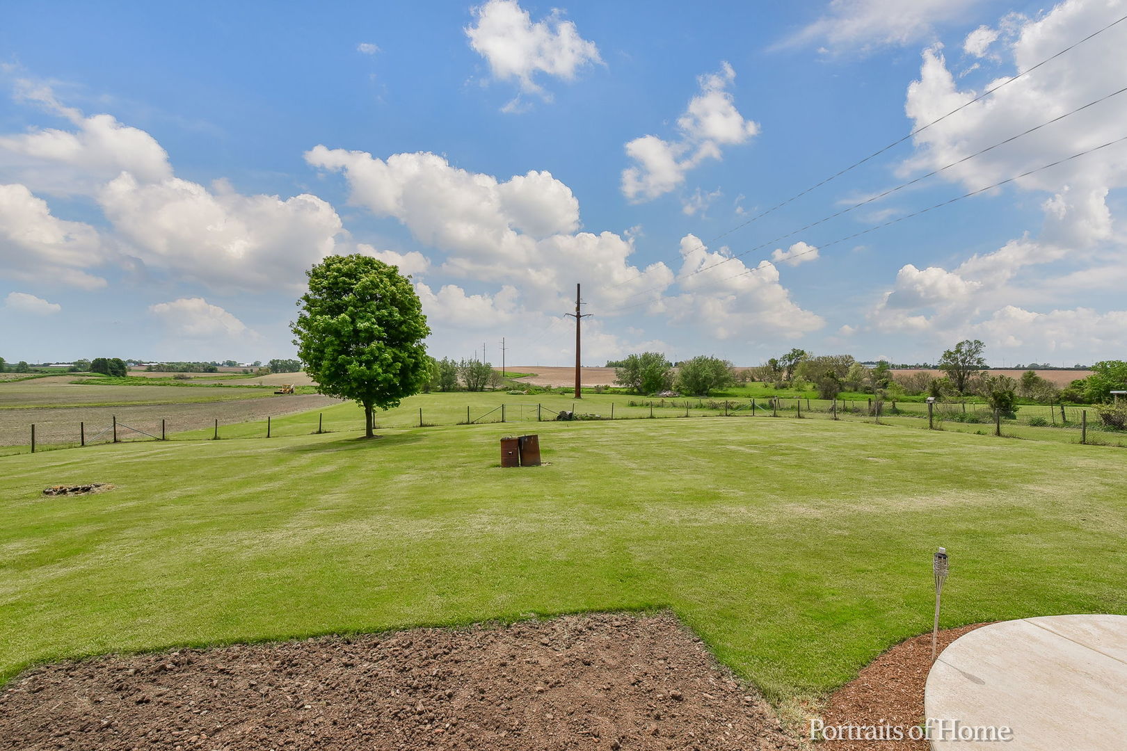10522 Perry Road DeKalb, IL 60115 - Photo 19 of 27 a view of a golf course with a lake