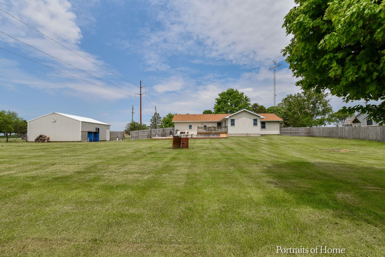 10522 Perry Road DeKalb, IL 60115 - Photo 20 of 27 a front view of house with yard and trees in the background