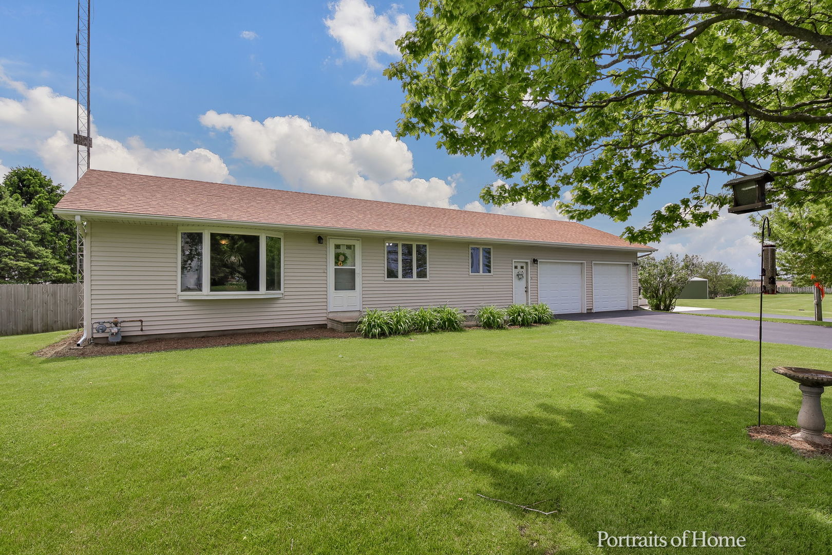 10522 Perry Road DeKalb, IL 60115 - Photo 26 of 27 a view of a house with a backyard