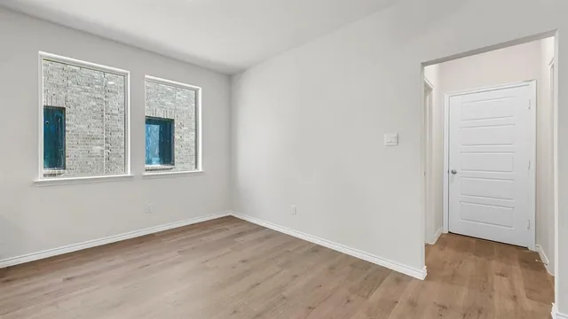 a view of kitchen with sink and microwave
