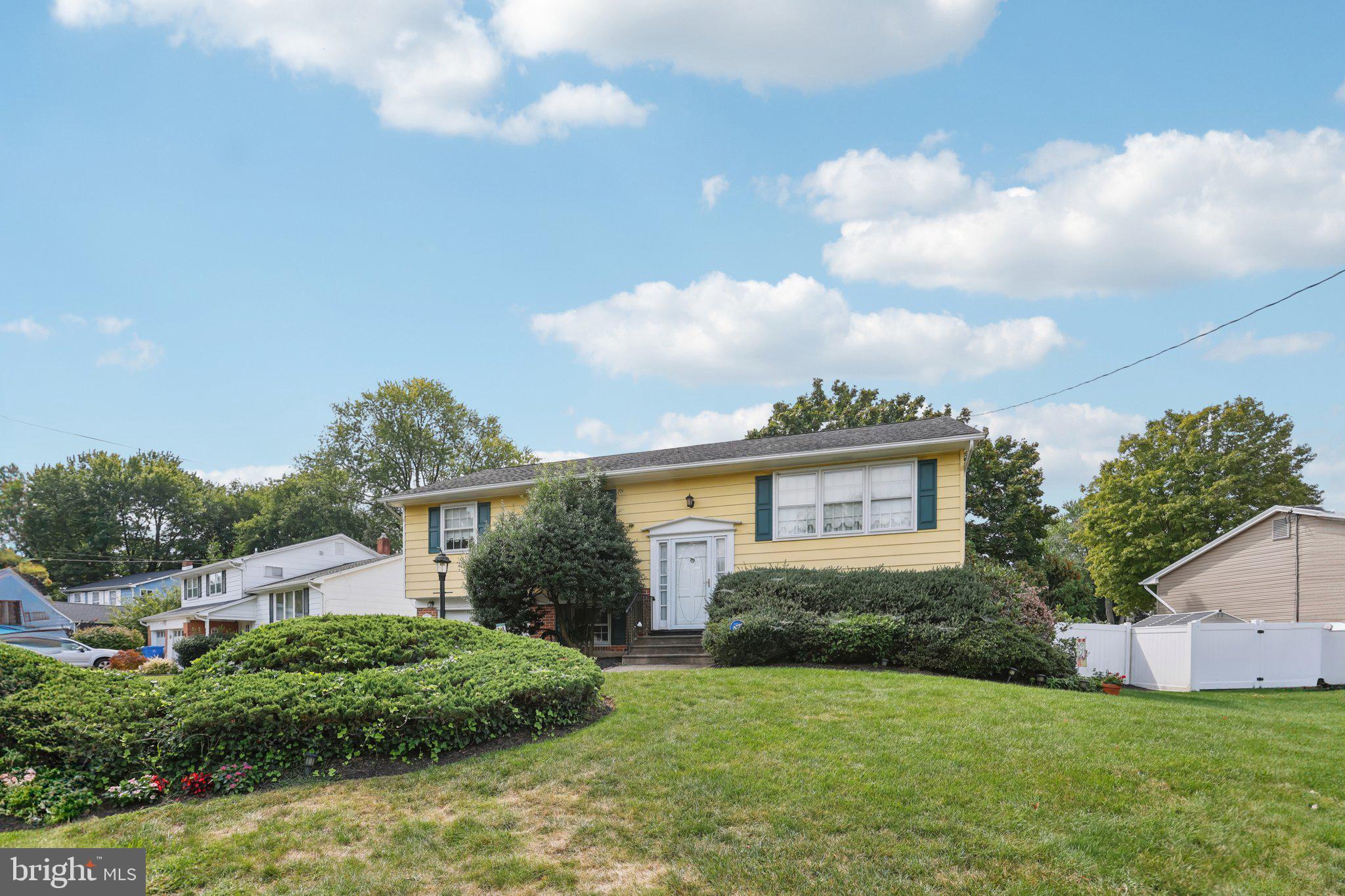 26 Regent Road Cherry Hill, NJ 08003 - Photo 2 of 36 a front view of a house with a yard and garage
