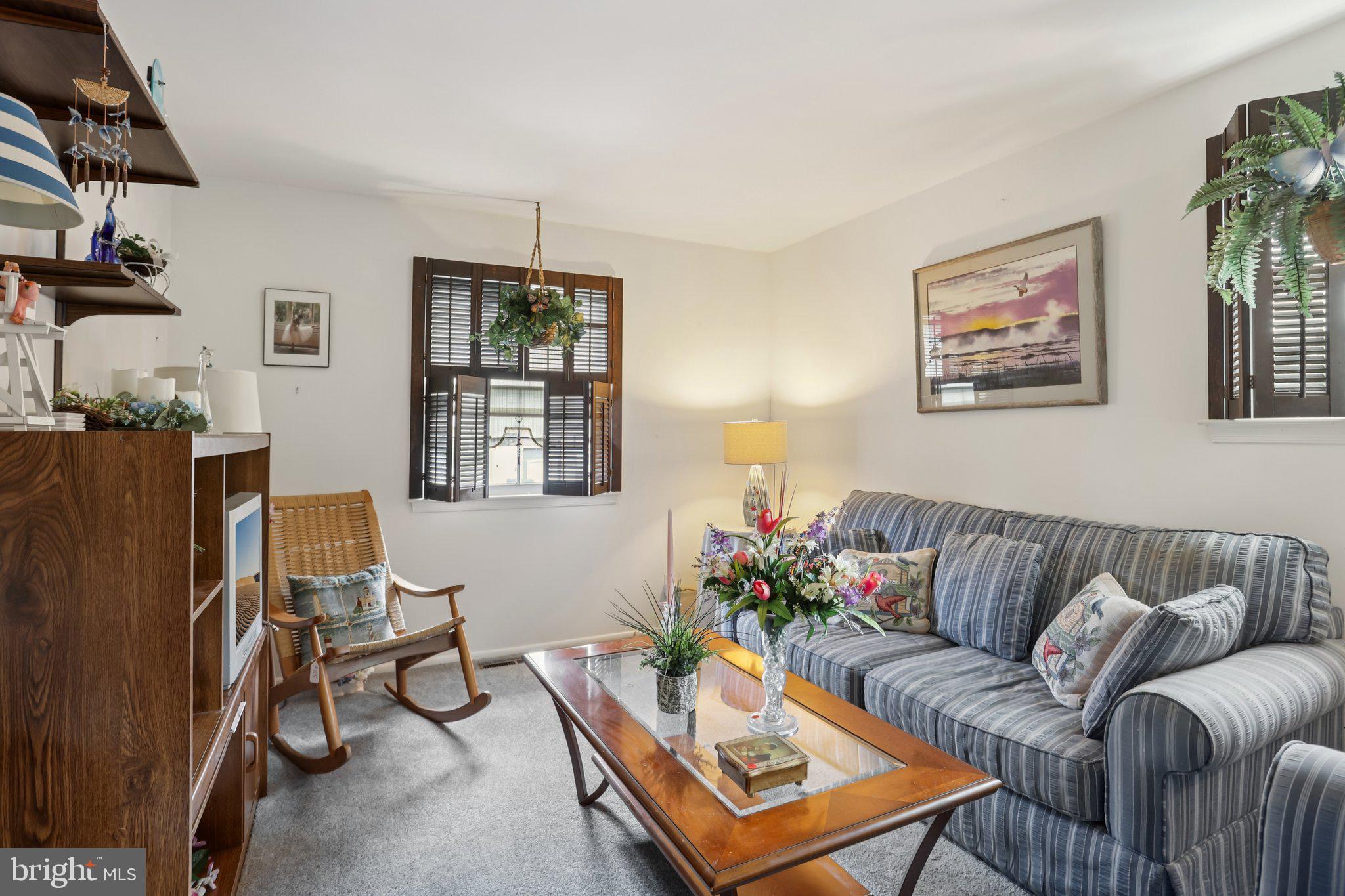 26 Regent Road Cherry Hill, NJ 08003 - Photo 21 of 36 a living room with furniture rug and window
