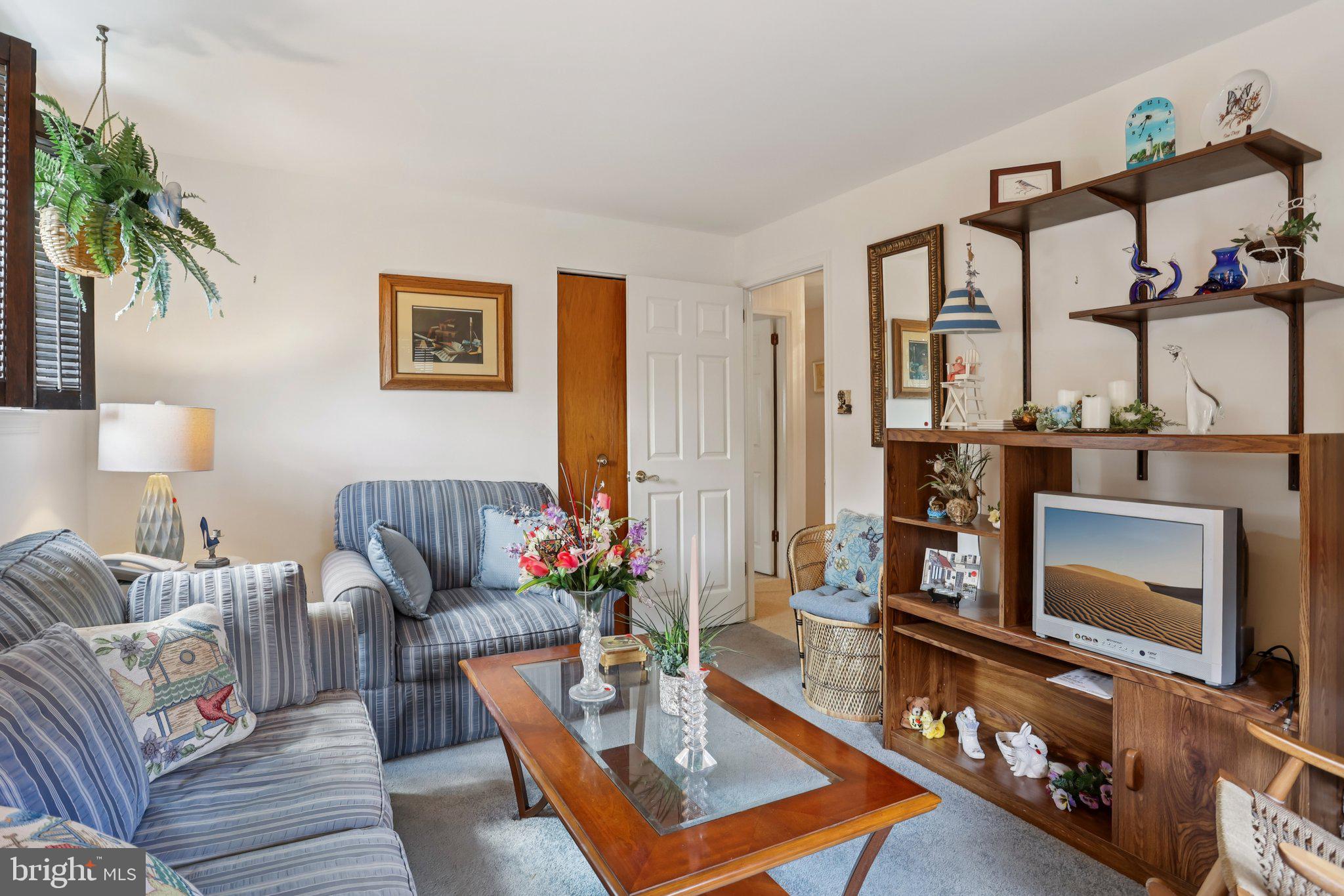 26 Regent Road Cherry Hill, NJ 08003 - Photo 22 of 36 a living room with furniture and a fireplace