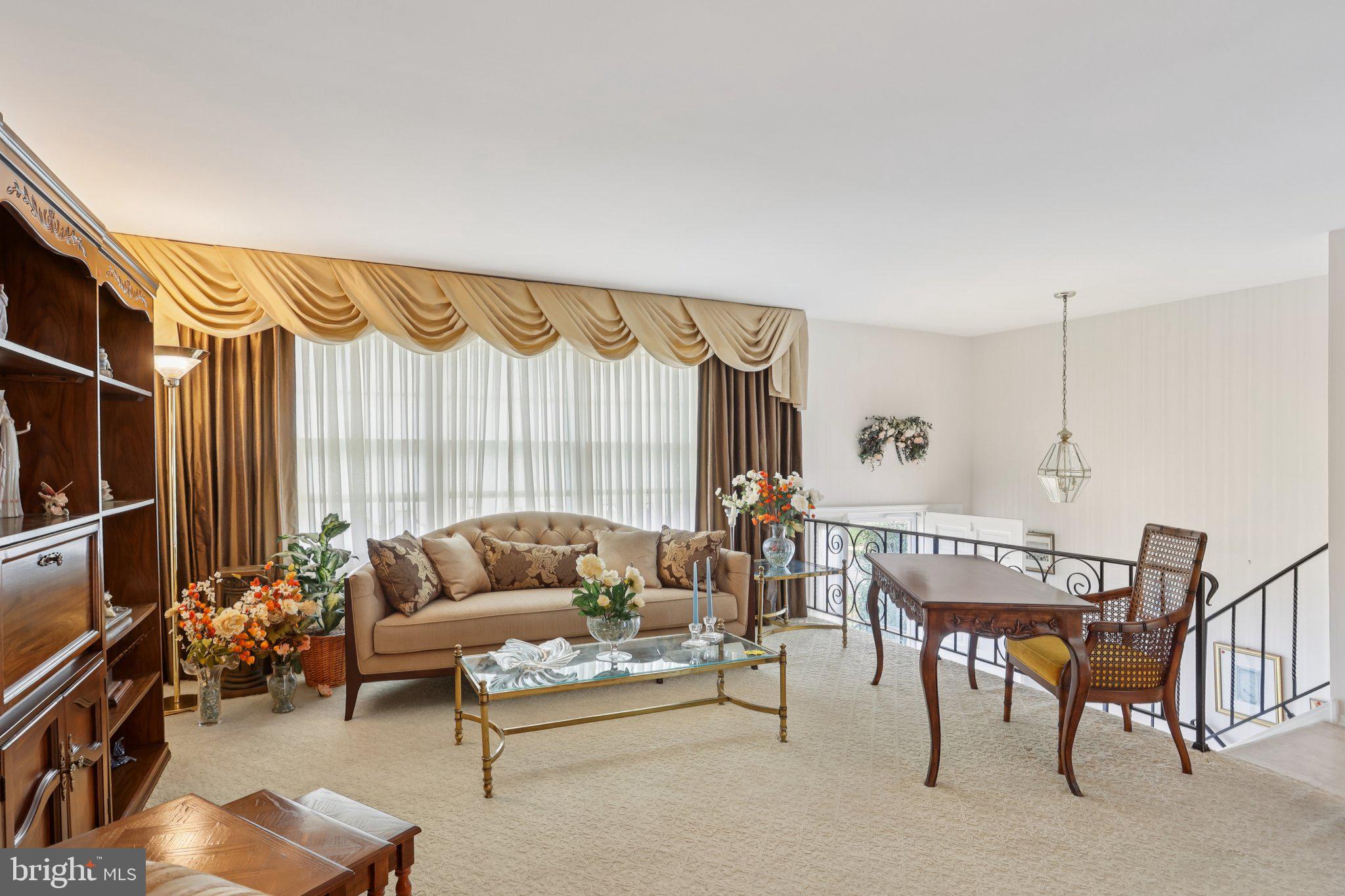 26 Regent Road Cherry Hill, NJ 08003 - Photo 7 of 36 a living room with furniture and a large window