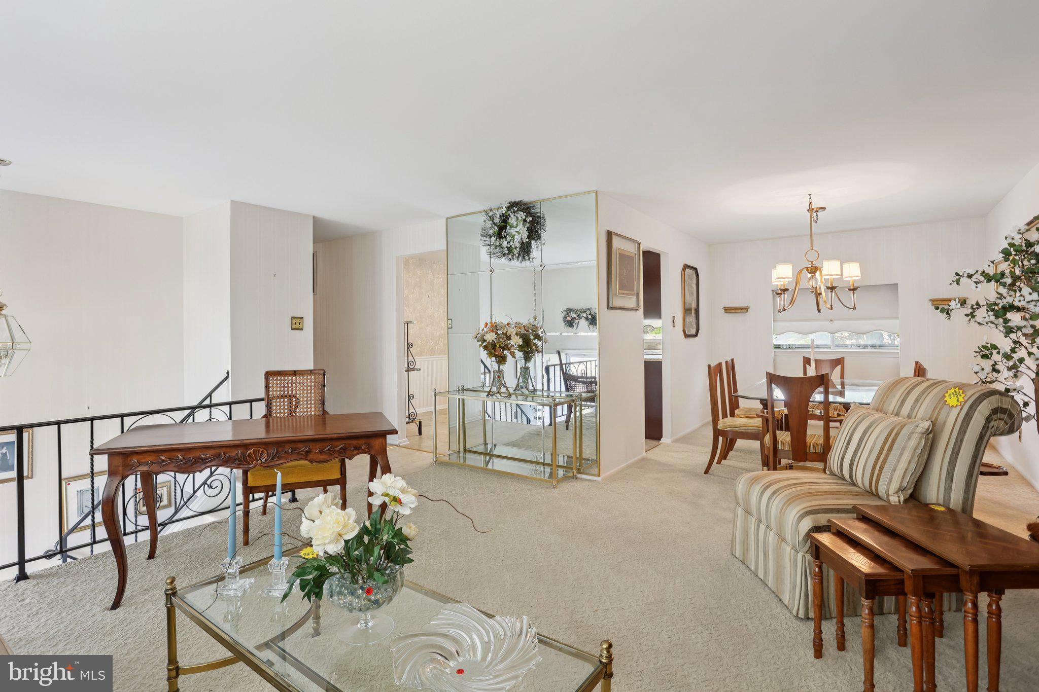 26 Regent Road Cherry Hill, NJ 08003 - Photo 9 of 36 a living room with furniture and a table