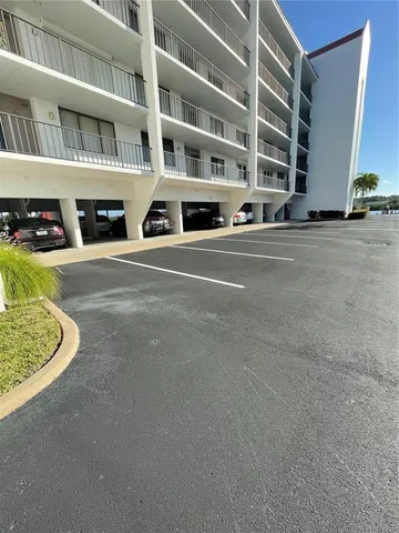 a view of building exterior with a chair