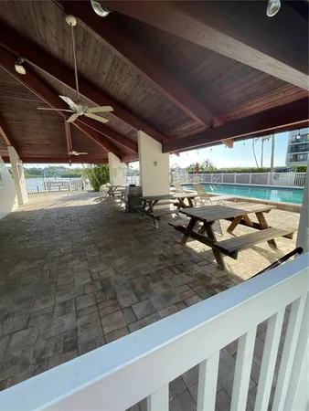 a kitchen with a table and chairs