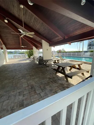 a kitchen with a table and chairs