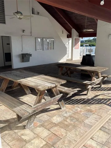 a living room with patio furniture