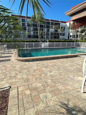 a view of a terrace with a lounge chair
