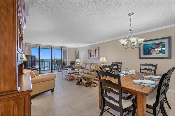 a living room with furniture a couch and a window
