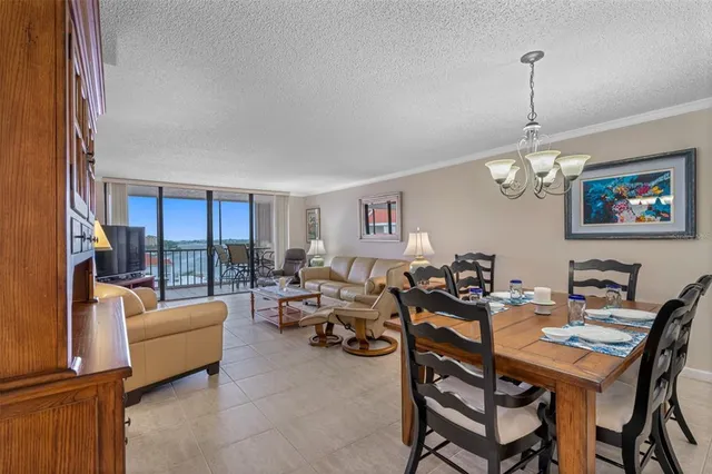 a living room with furniture a couch and a window