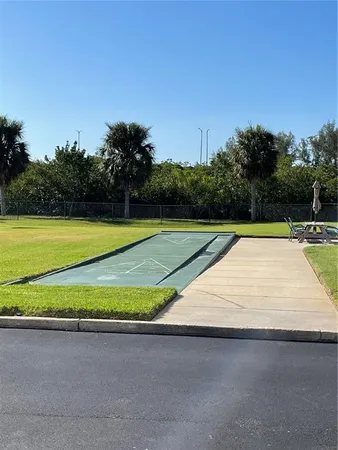 a view of an outdoor space and tennis court