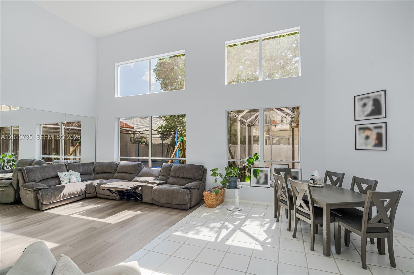 17244 Balboa Point Way Boca Raton, FL 33487 - Photo 2 of 66 a living room with furniture and a potted plant