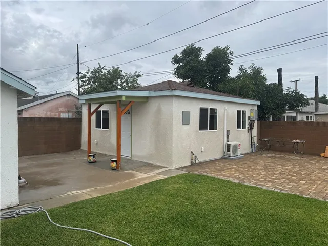 a utility room with sink dryer and washer