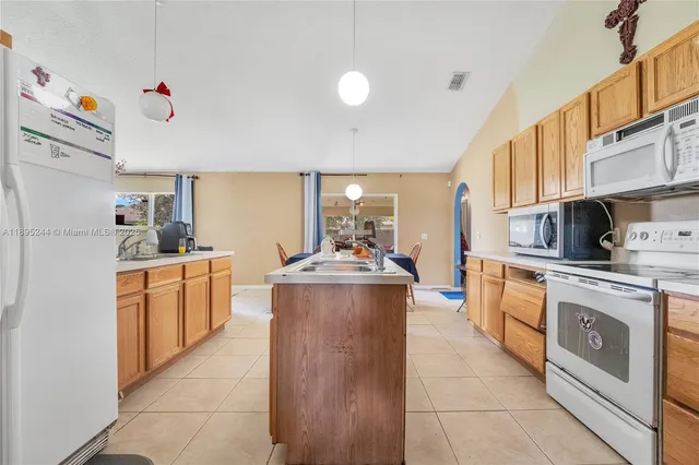 $450,000 | 4610 Southwest Cacao Street, Port St. Lucie, FL 34953