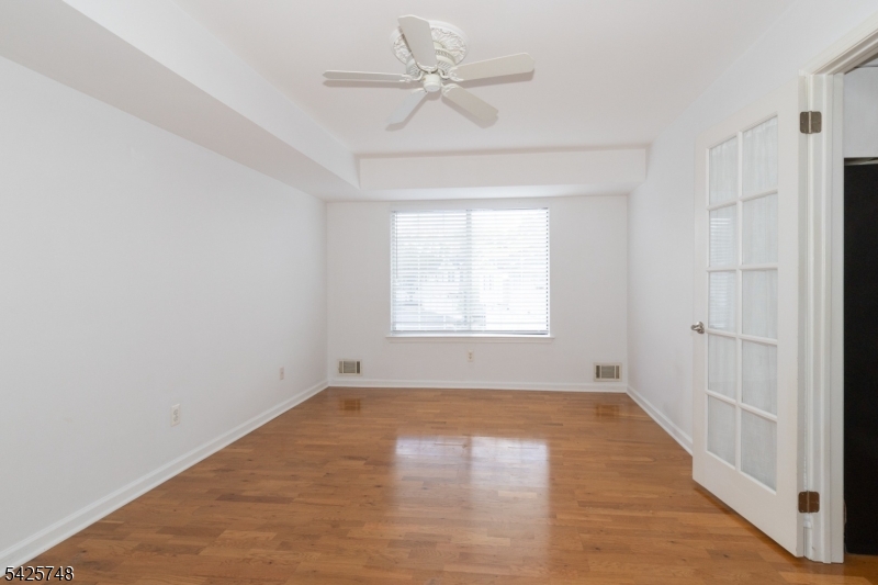10 Crestmont Road Bedminster, NJ 07921 - Photo 20 of 41 wooden floor in an empty room with a window